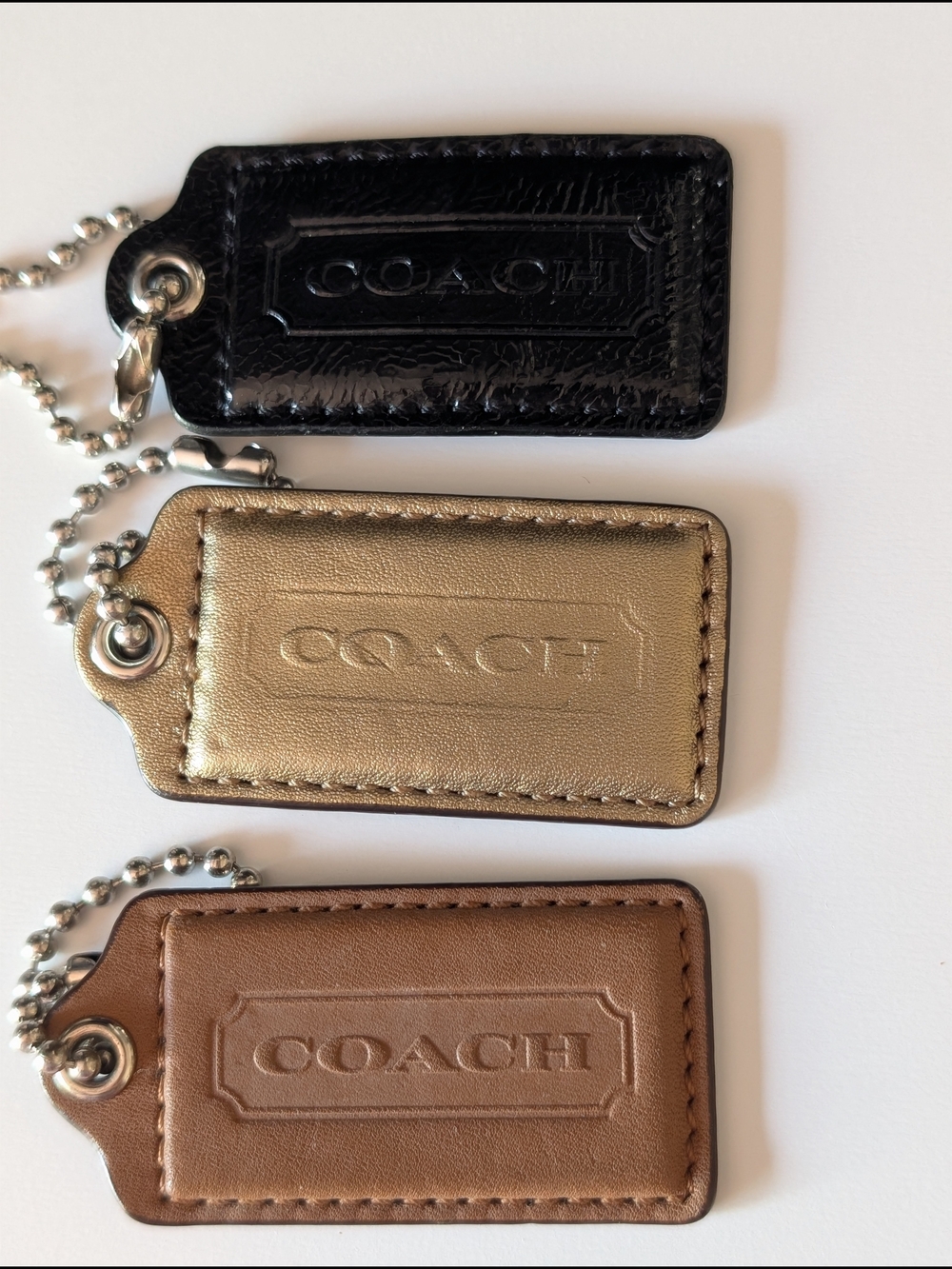 Coach Leather Hangtag Trio - Black, Gold, Brown